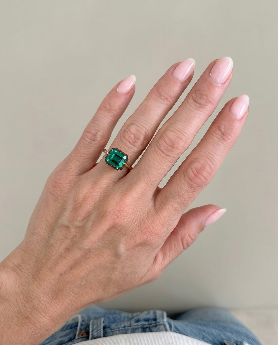 East-West Emerald Cut Emerald Ring Image 1