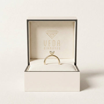 Gold ring in a Veda Diamonds box
